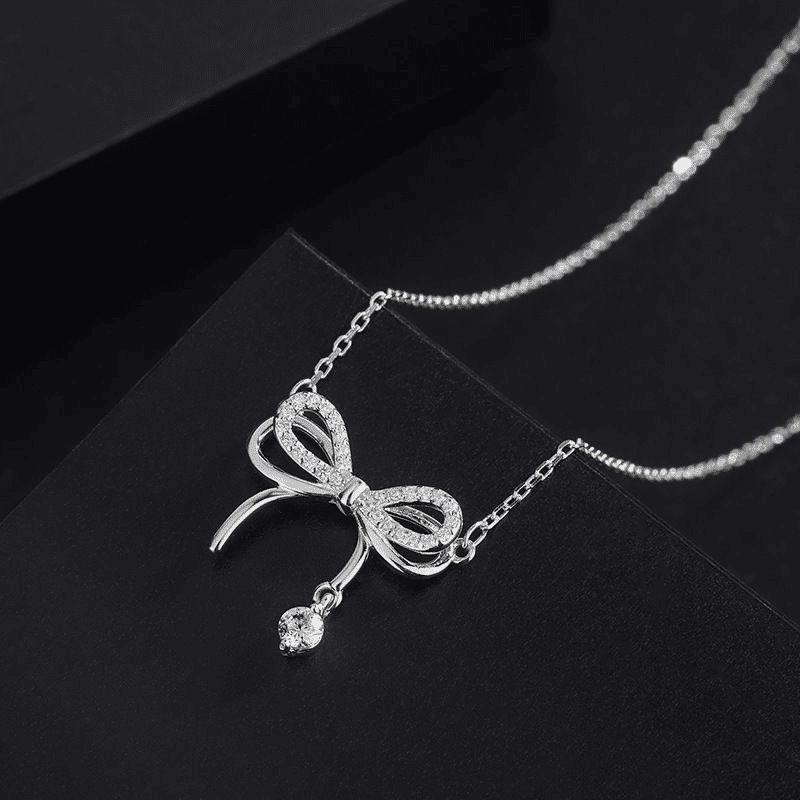 Elegant Silver Bowknot Pendant Necklace for Women - Fashionable Alloy Jewelry